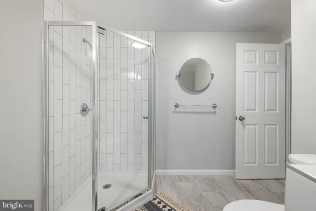 a backyard of a house with a yard and outdoor seating