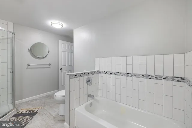 a room with wooden walls and furniture