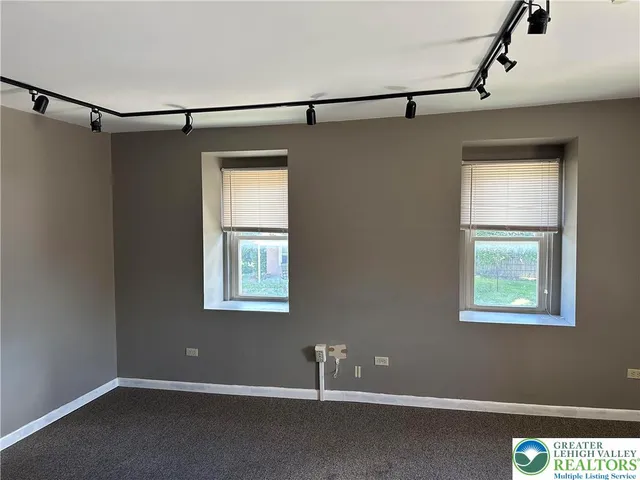 a view of a window in an empty room