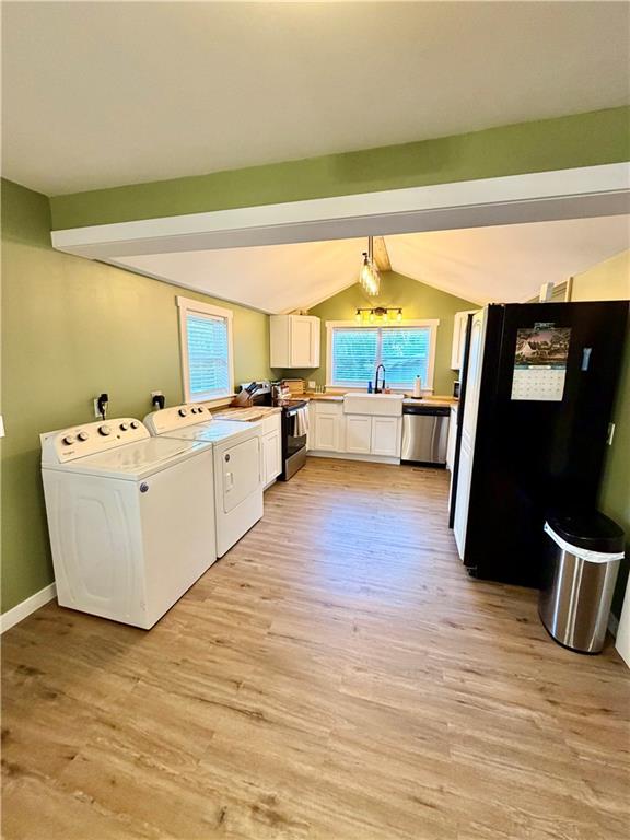 525 Wildcat Bridge Road Royston, GA 30662 - Photo 11 of 26 a white kitchen with a sink and wooden floor