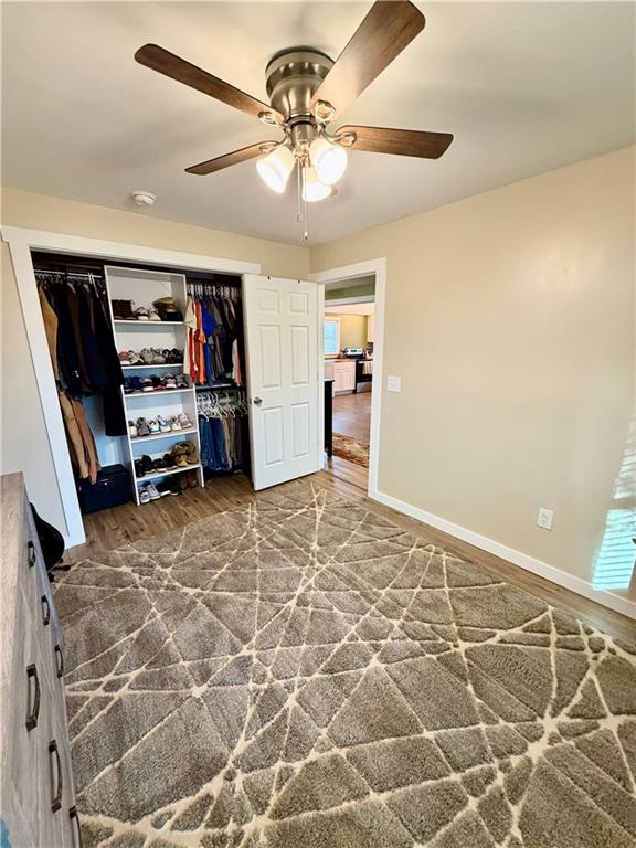 525 Wildcat Bridge Road Royston, GA 30662 - Photo 16 of 26 a view of a livingroom with furniture and a ceiling fan
