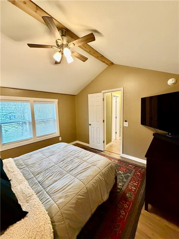 525 Wildcat Bridge Road Royston, GA 30662 - Photo 23 of 26 a bedroom with a bed and a flat screen tv