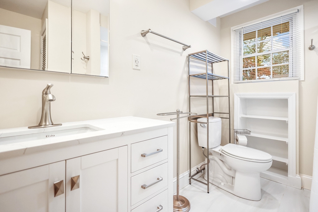 2 Constitution Way, Unit C Methuen, MA 01844 - Photo 10 of 14 a bathroom with a sink a toilet and shower