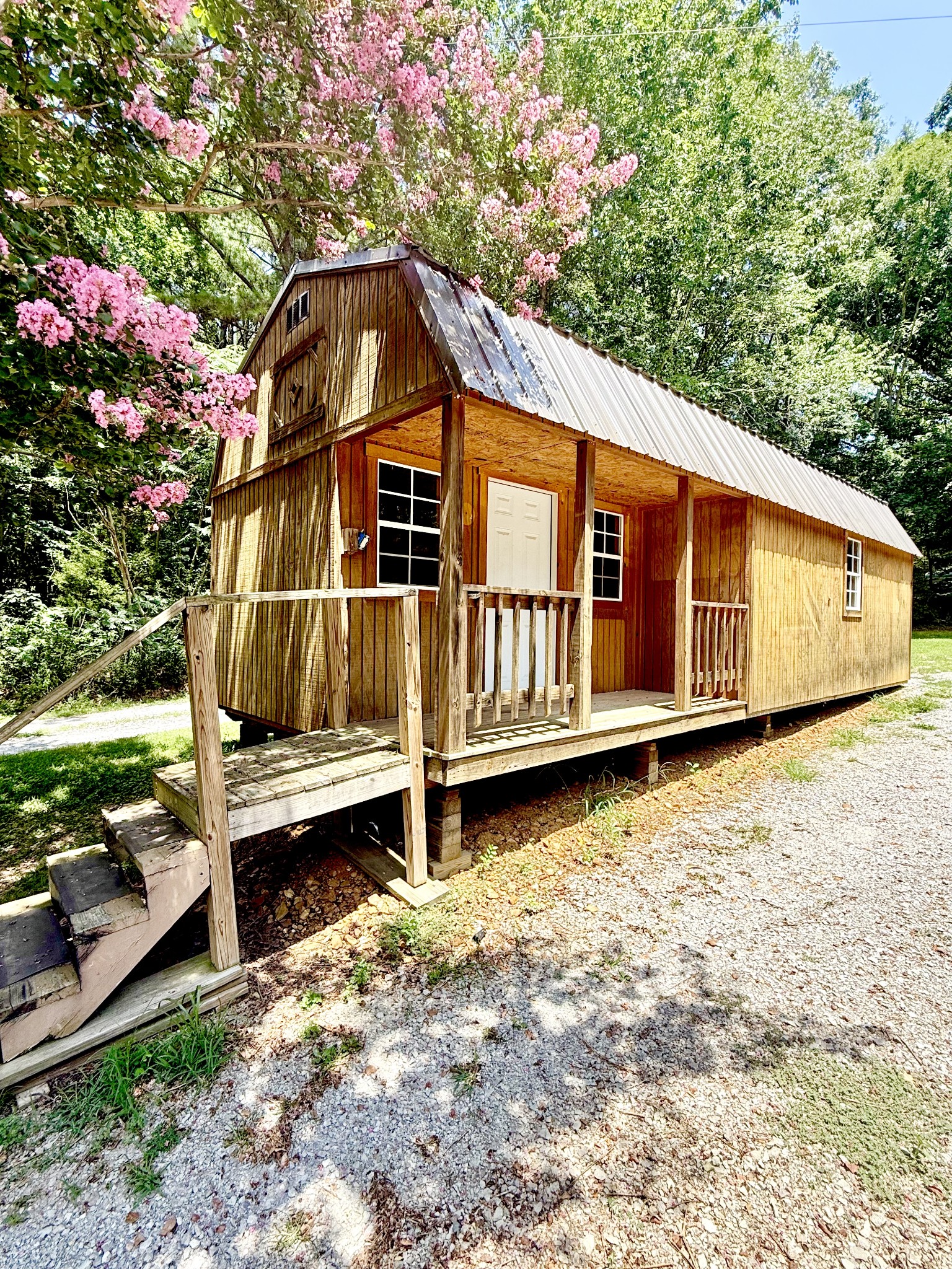 1520 Old Springville Road Springville, TN 38256 - Photo 9 of 16 a backyard of a house with wooden fence and large trees