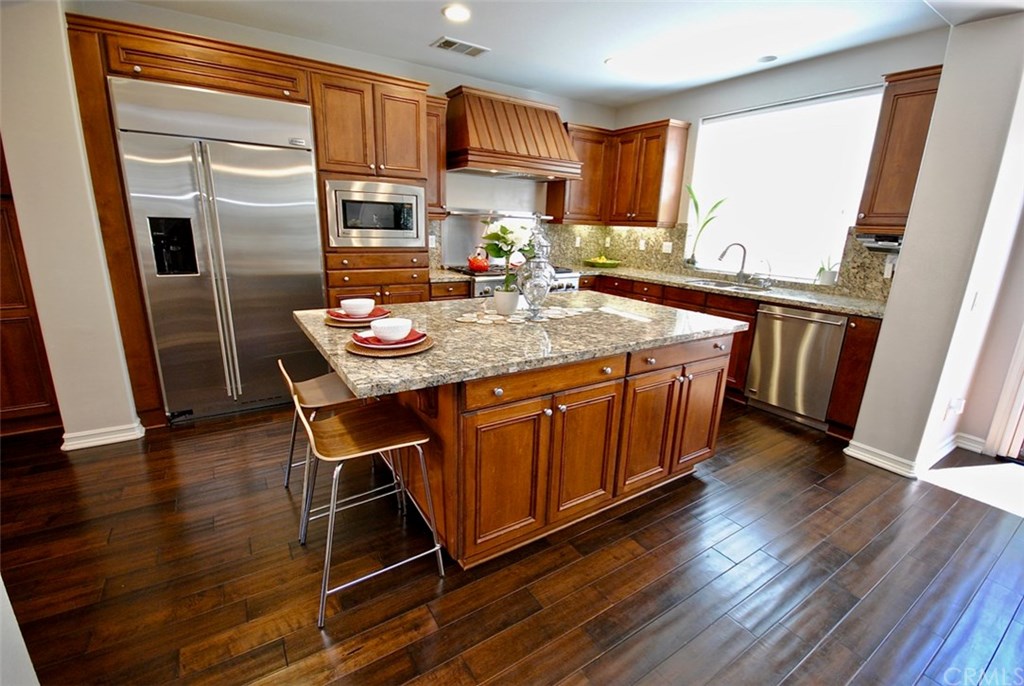 15530 Cardamon Way Tustin, CA 92782 - Photo 24 of 50 Wood Floors in Kitchen