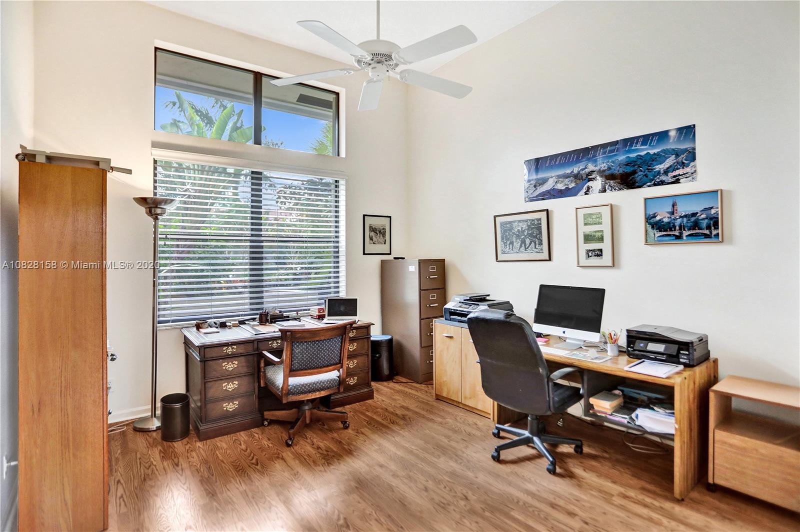 390 Alexandra Circle Weston, FL 33326 - Photo 36 of 71 a view of a workspace with furniture and a window