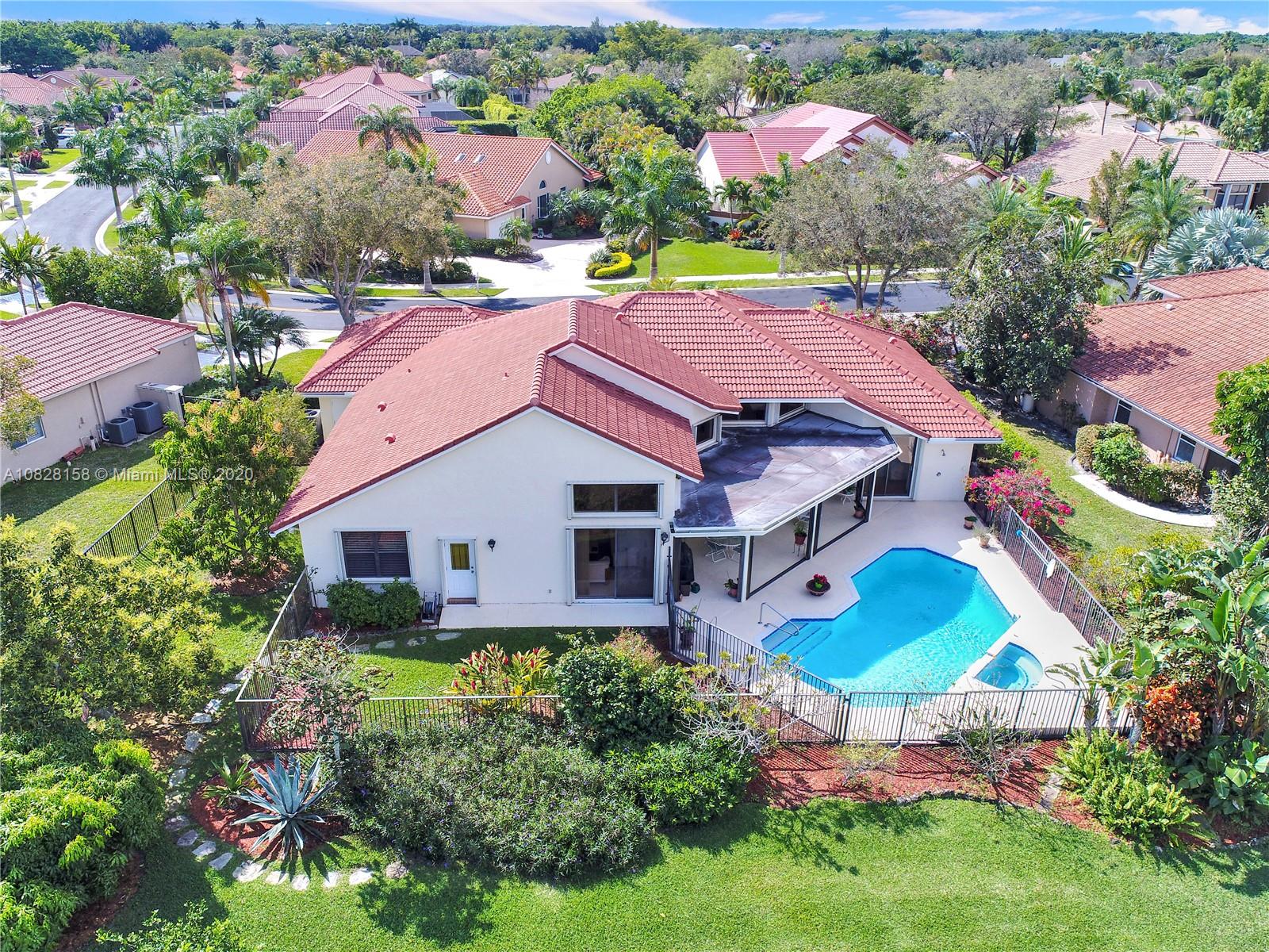 390 Alexandra Circle Weston, FL 33326 - Photo 55 of 71 an aerial view of house with yard