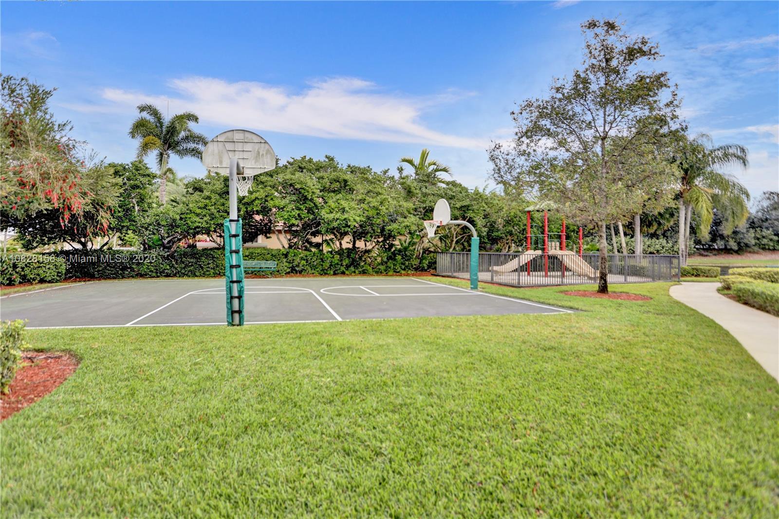 390 Alexandra Circle Weston, FL 33326 - Photo 67 of 71 a view of a park with swings and slides