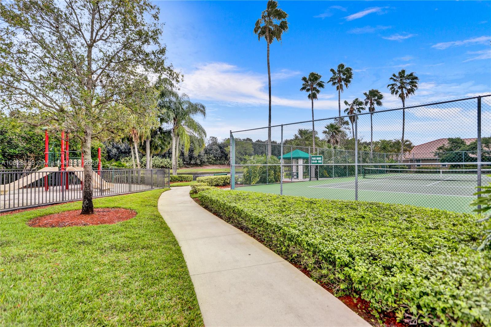 390 Alexandra Circle Weston, FL 33326 - Photo 71 of 71 a view of a garden with a slide