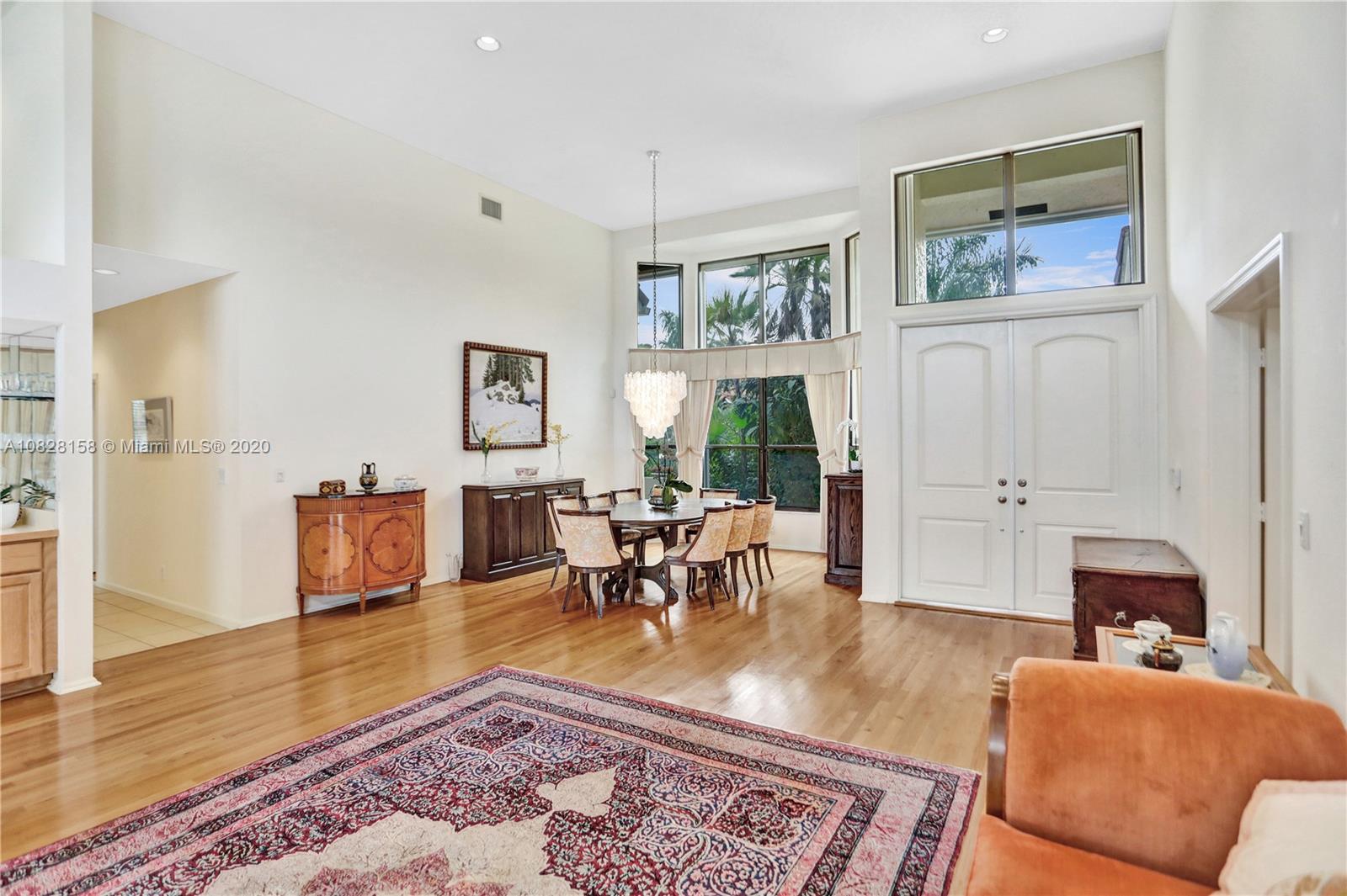 390 Alexandra Circle Weston, FL 33326 - Photo 9 of 71 a living room with furniture and a wooden floor