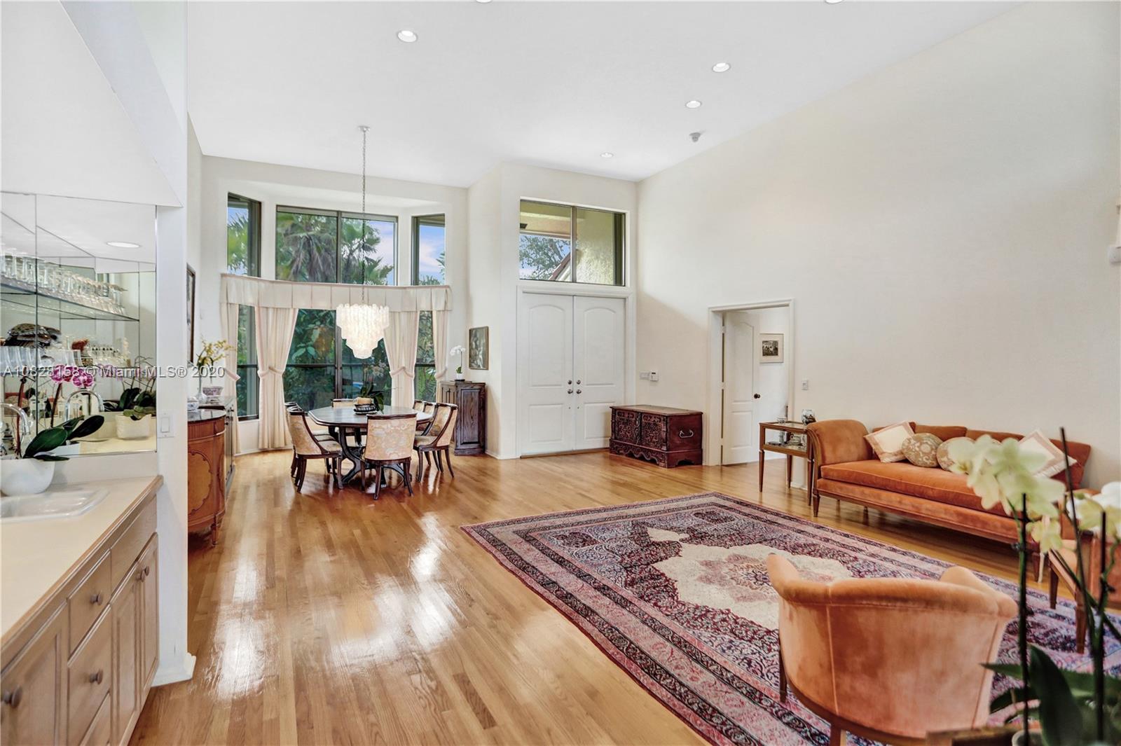390 Alexandra Circle Weston, FL 33326 - Photo 10 of 71 a living room with furniture and a wooden floor