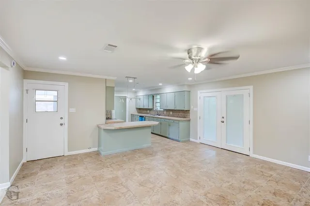 a view of kitchen and windows