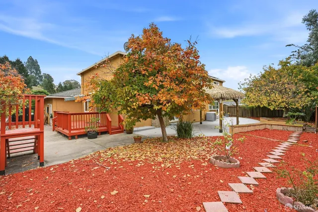 a backyard of a house with lots of green space