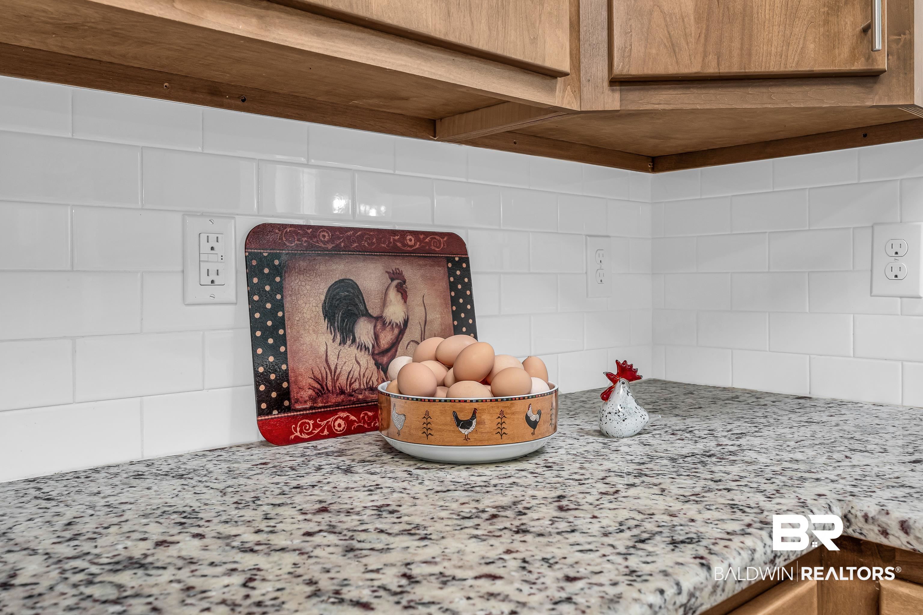 18255 Cactus Court Elberta, AL 36530 - Photo 21 of 53 Kitchen view of backsplash and light stone counters