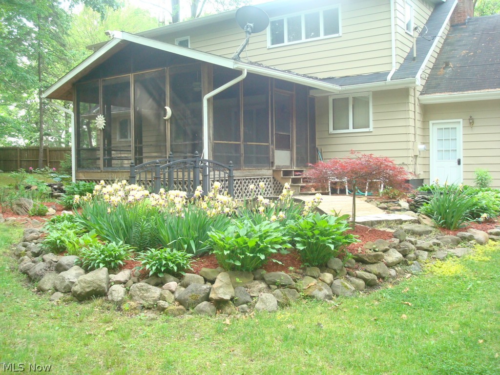 5731 Nolley Road Akron, OH 44319 - Photo 2 of 20 Koi pond with a bridge, waterfall and river. So pretty!