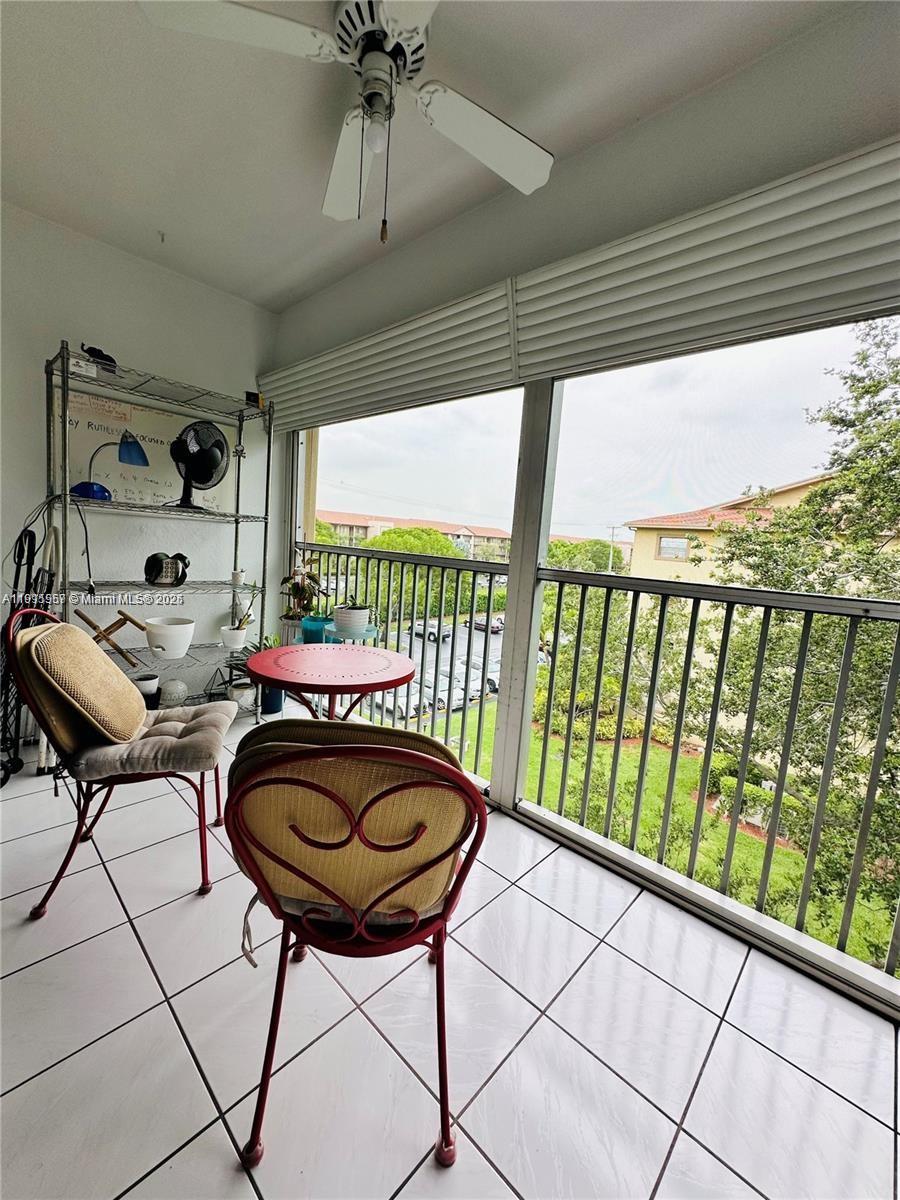 1400 Southwest 124th Terrace, Unit 402Q Pembroke Pines, FL 33027 - Photo 15 of 20 a outdoor space with furniture