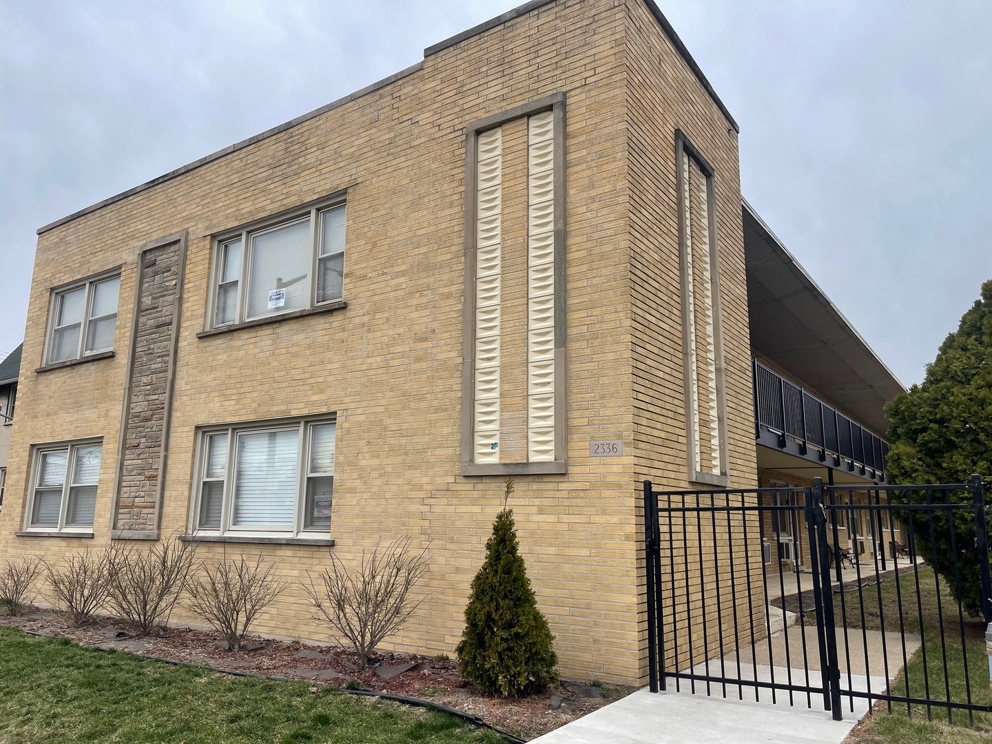 2336 Union Street, Unit 3 Blue Island, IL 60406 - Photo 17 of 19 a front view of a house with a yard