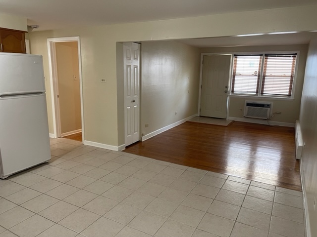 2336 Union Street, Unit 3 Blue Island, IL 60406 - Photo 5 of 19 a view of an empty room with a stove