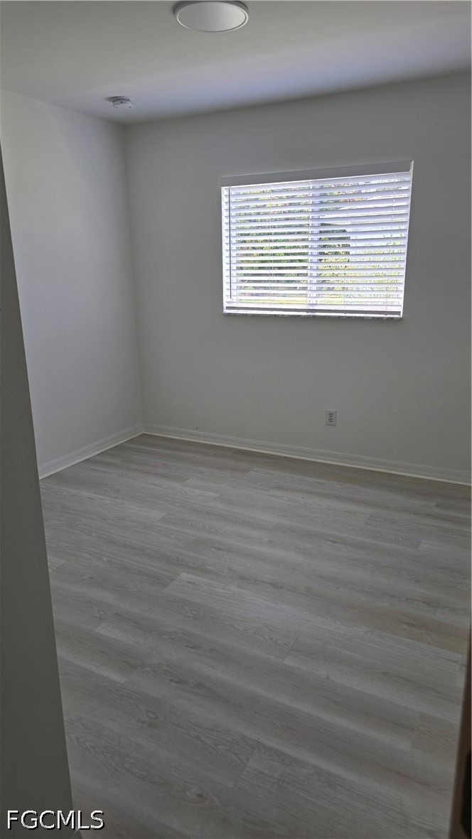 236-238 Peerless Street Lehigh Acres, FL 33974 - Photo 14 of 25 a view of an empty room with a window
