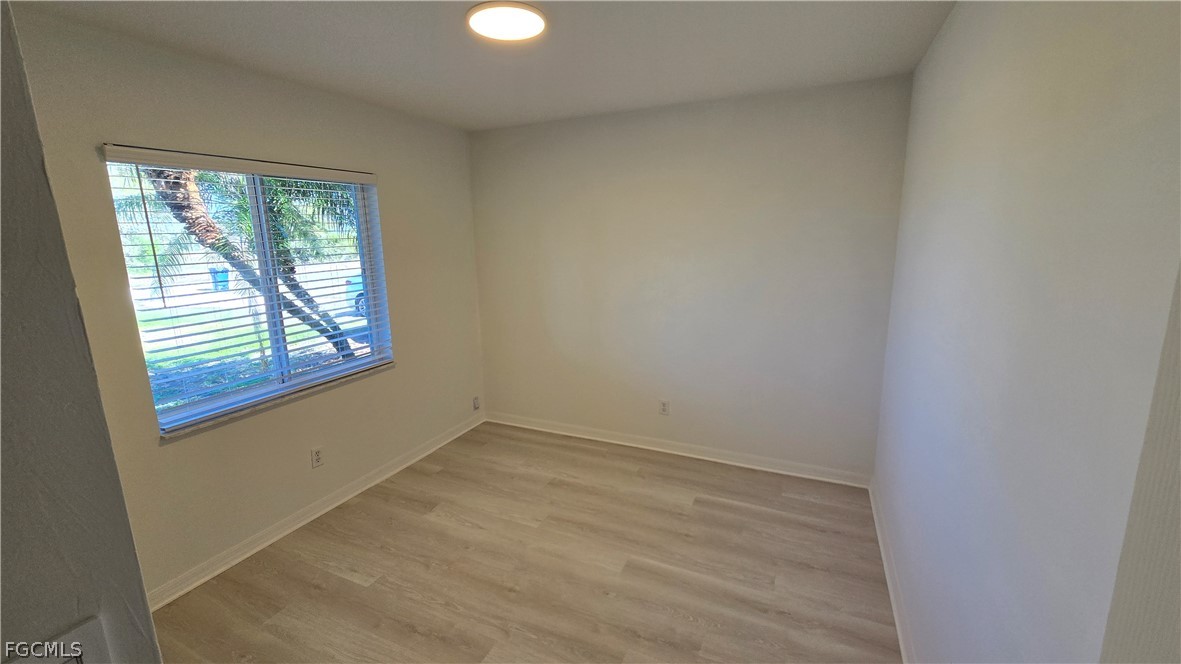 236-238 Peerless Street Lehigh Acres, FL 33974 - Photo 16 of 25 an empty room with a window