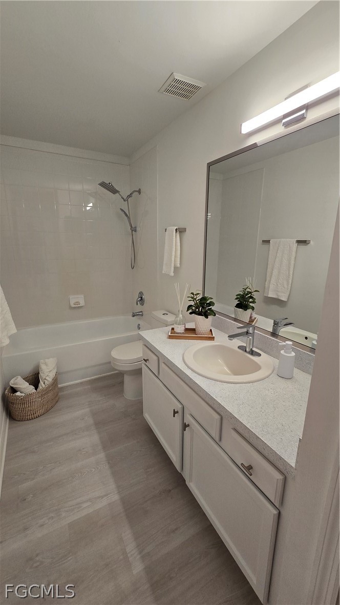 236-238 Peerless Street Lehigh Acres, FL 33974 - Photo 17 of 25 a bathroom with a double vanity sink and a mirror