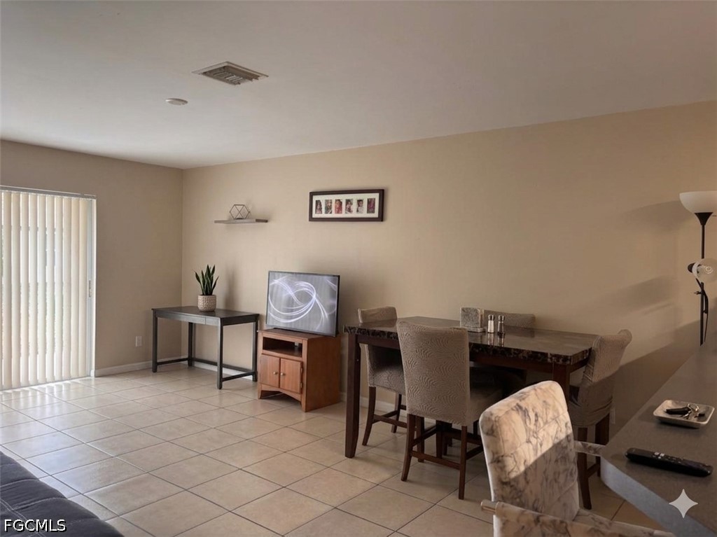 236-238 Peerless Street Lehigh Acres, FL 33974 - Photo 19 of 25 a workspace with furniture and a window