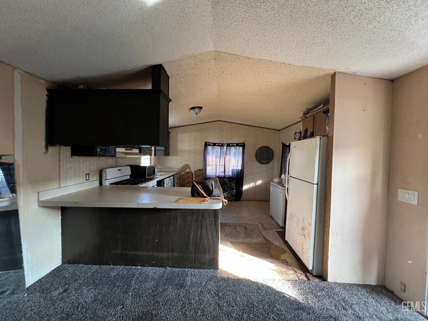 Undisclosed Address Bakersfield, CA 93309 - Photo 3 of 14 a view of a workspace with furniture