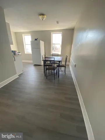 a view of a livingroom with furniture and window