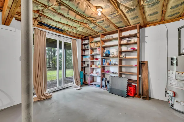a view of a brick house with a large window