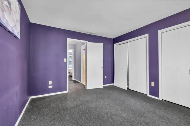 a view of an empty room with window