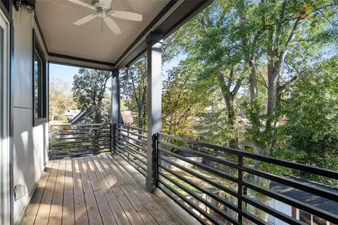 a view of a balcony with a ocean view