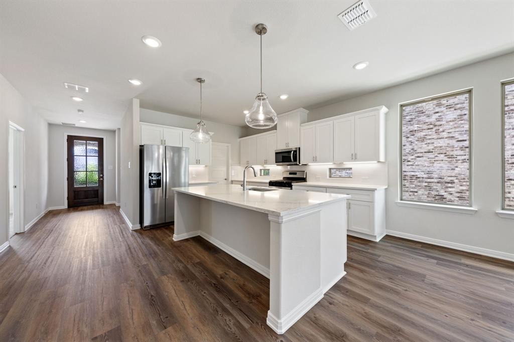 1844 Rosedale Avenue Van Alstyne, TX 75495 - Photo 5 of 26 Light, bright and spacious, you'll find the kitchen of your dreams in this wonderful home!