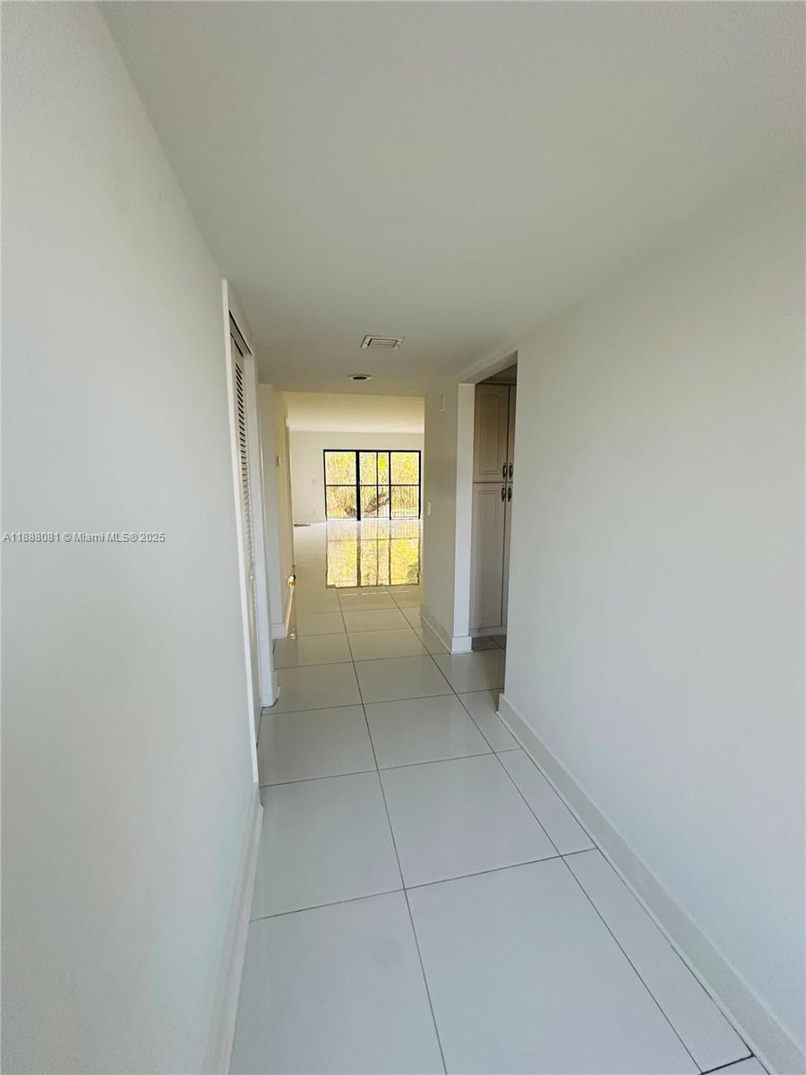 16491 Blatt Boulevard, Unit 202 Weston, FL 33326 - Photo 19 of 21 a view of an empty room and window