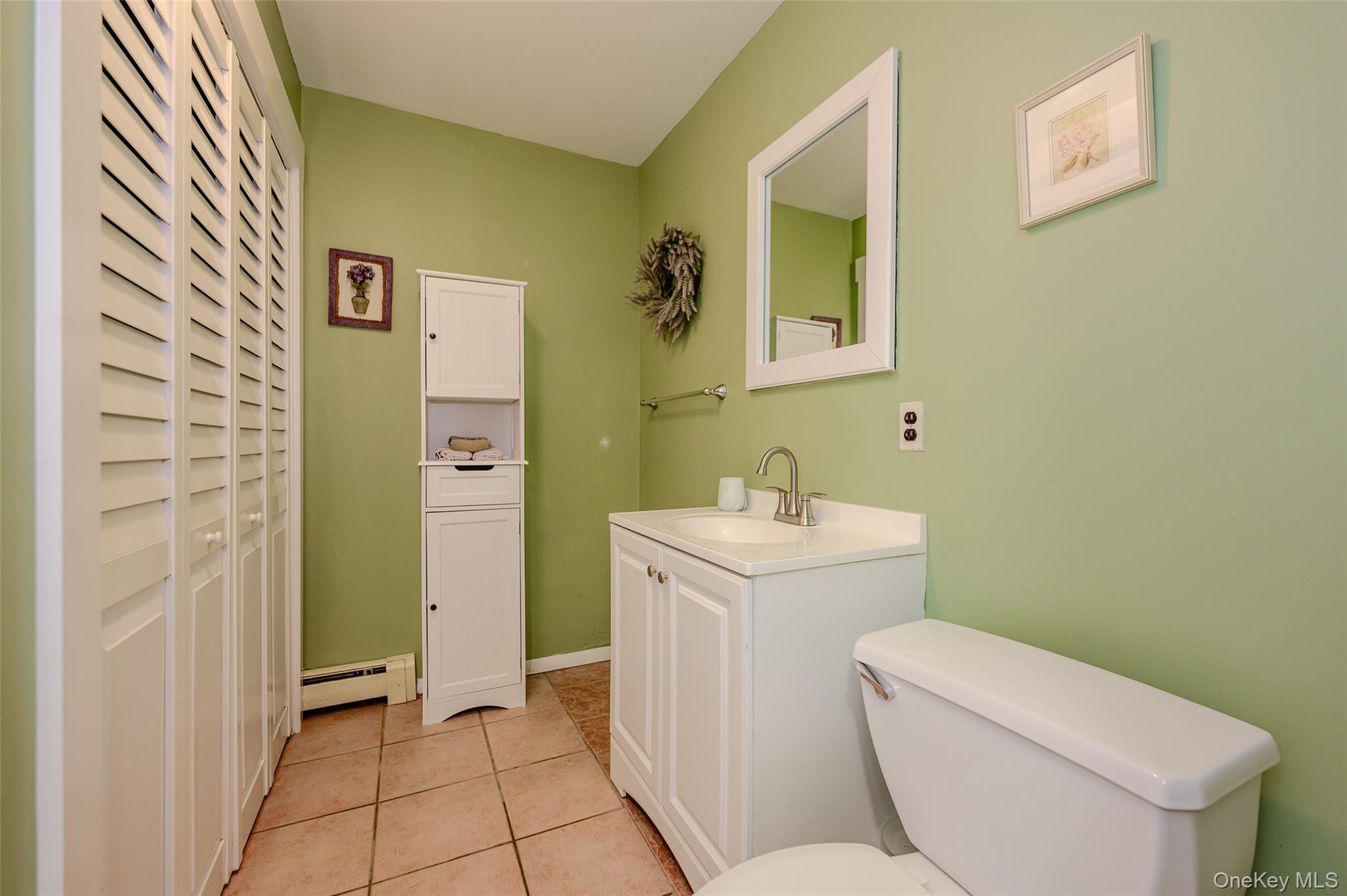 231 Increase Miller Road Katonah, NY 10536 - Photo 17 of 34 Lower level half-bath with laundry.