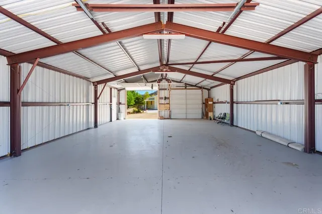 a view of a room with wooden walls