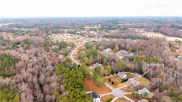 a view of swimming pool from a balcony