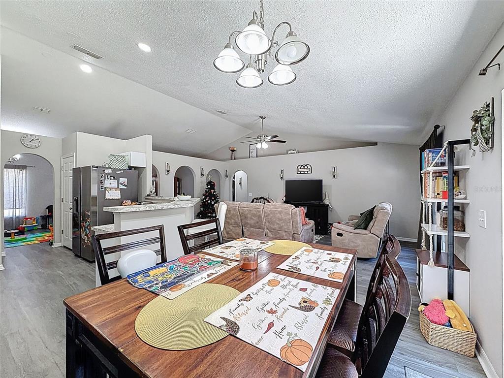 16061 Cave Swallow Road Brooksville, FL 34614 - Photo 24 of 47 a very nice looking dining room with a table and chairs