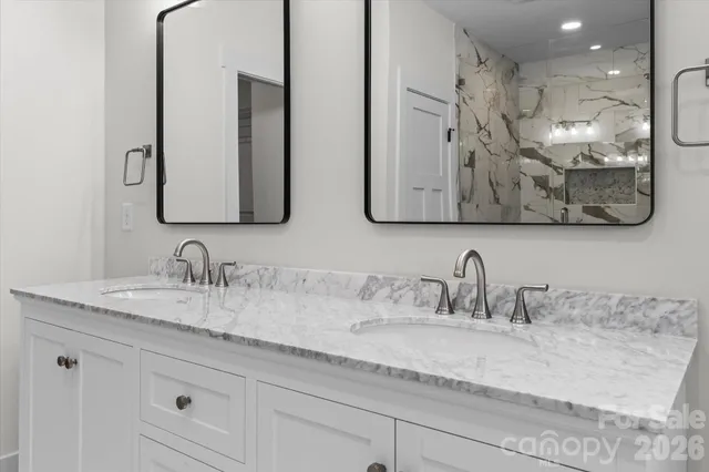 a white bath tub sitting in a bathroom