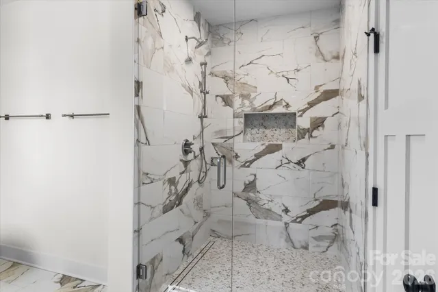 a bathroom with a sink and vanity
