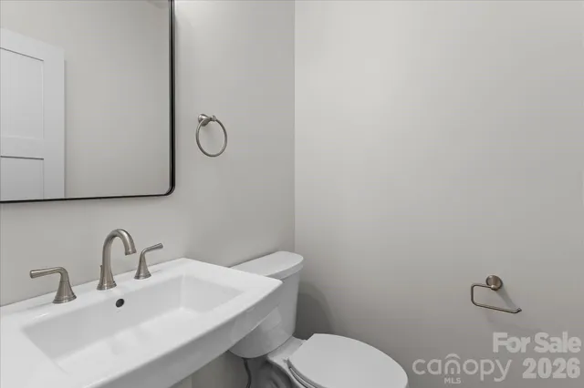 a view of a hallway with an empty room