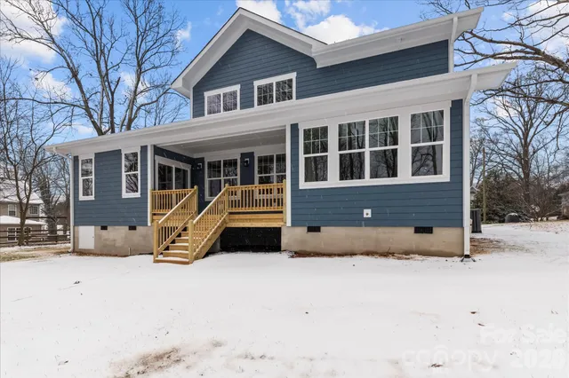 a view of a house with a large window