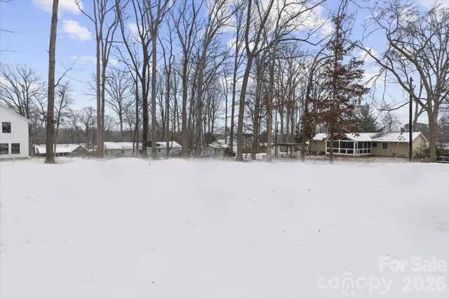 a view of road with snow on the road