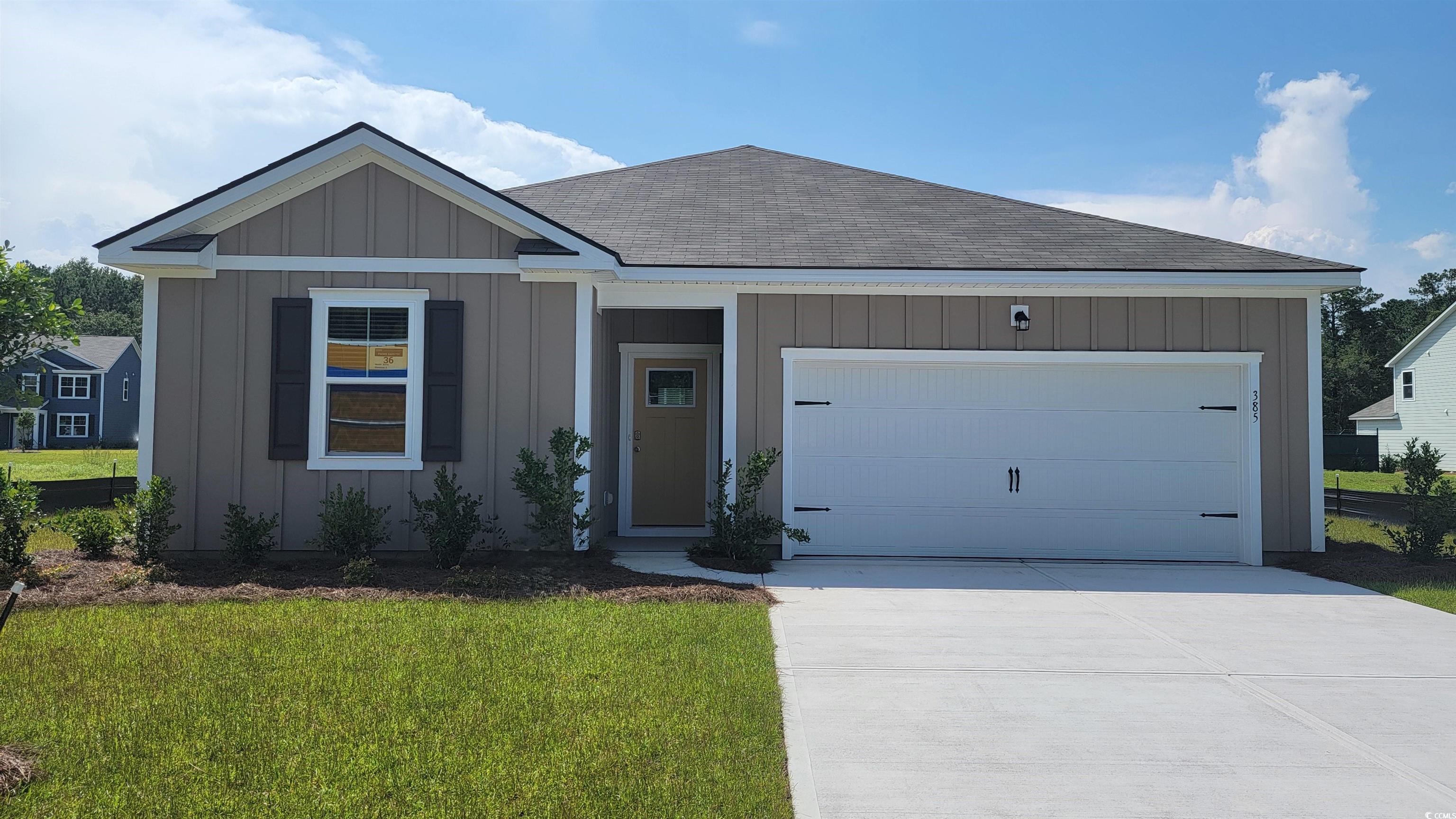 385 Rookroost Circle Conway, SC 29526 - Photo 1 of 19 Ranch-style home featuring a shingled roof, board