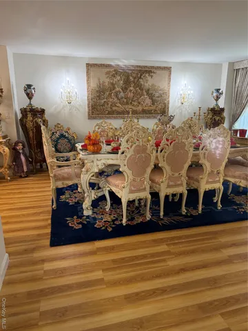 a kitchen with a stove a sink and a microwave