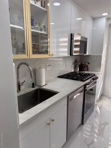 a bedroom with bed and a window