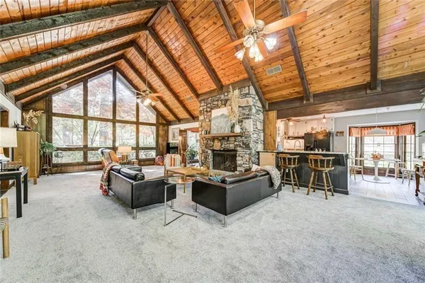 a dining room with furniture window and outdoor view