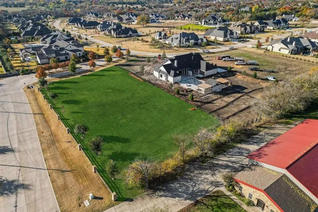 an aerial view of a city with lots of residential buildings