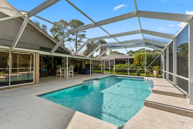 a view of a livingroom with furniture and a table