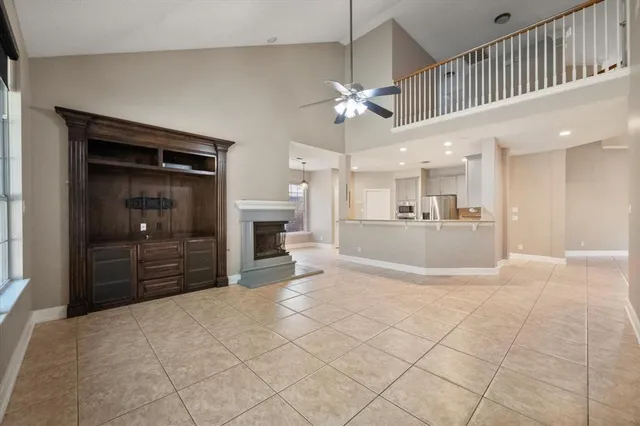 a view of a livingroom with a kitchen