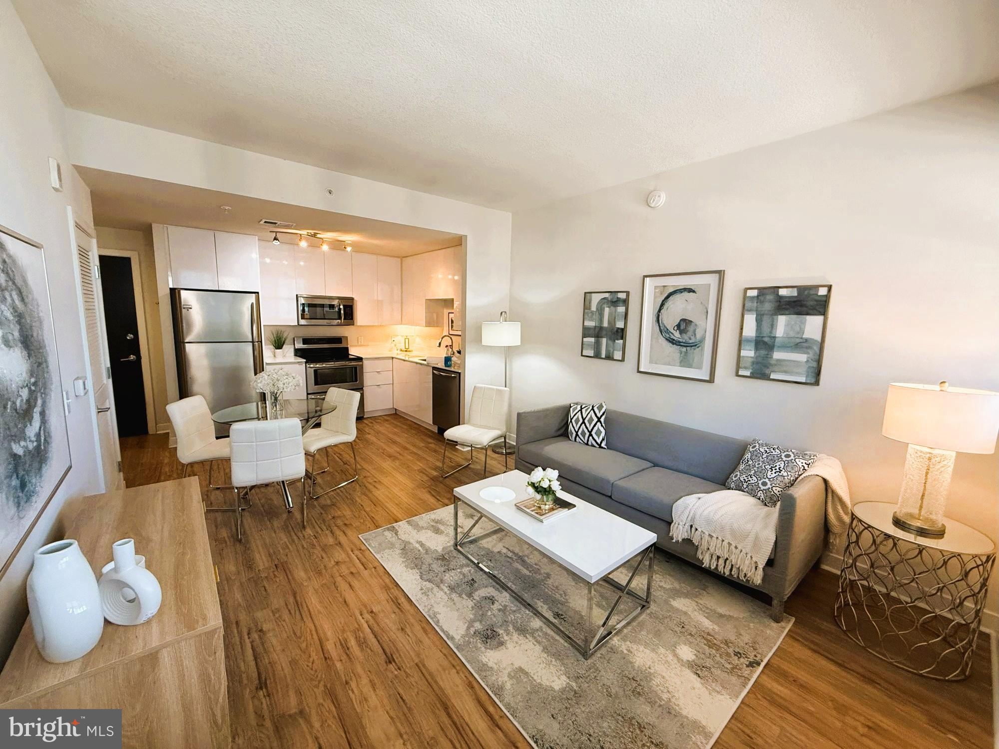 Modern living space with open kitchen design.